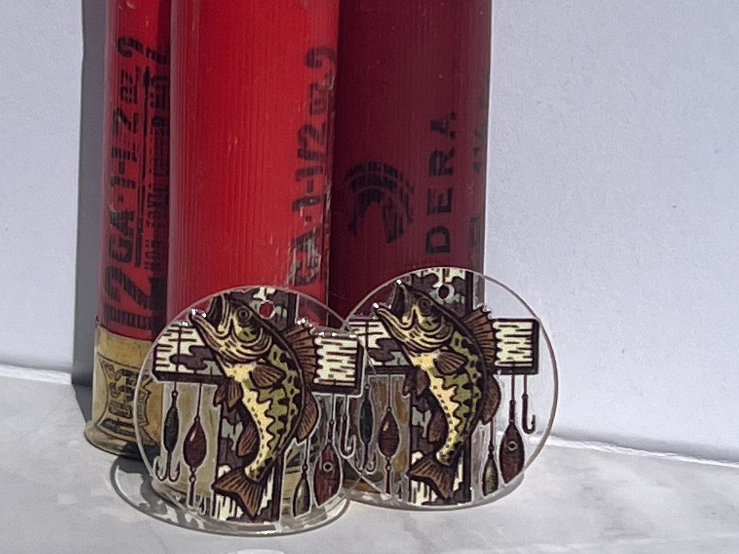 round earrings bass on cross