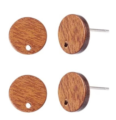 Wooden round earring finding on a white background