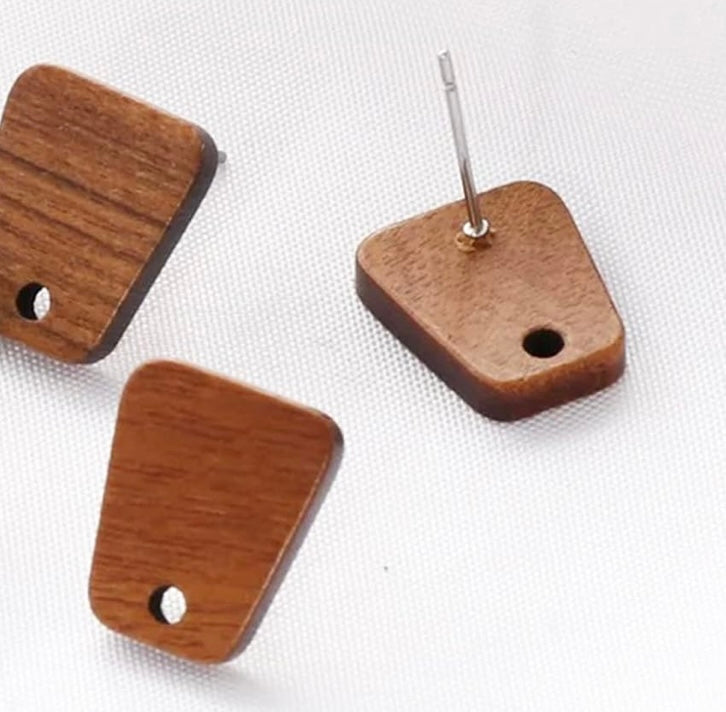 Wooden square earrings on a white background